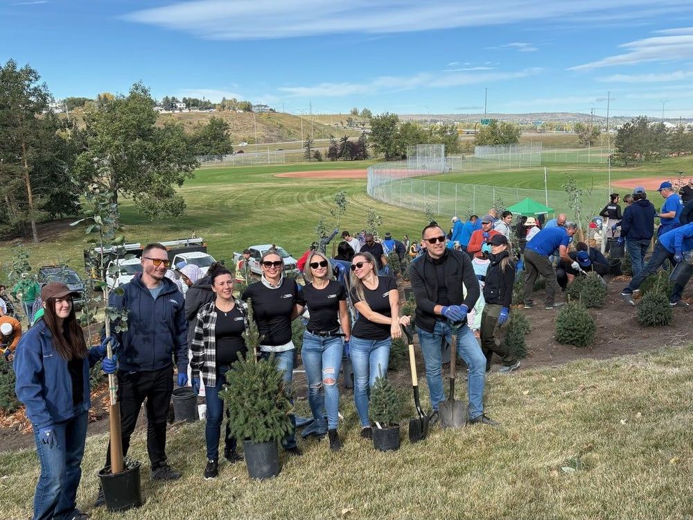The Canadian Choice Calgary team planting trees on Tree Day 2025