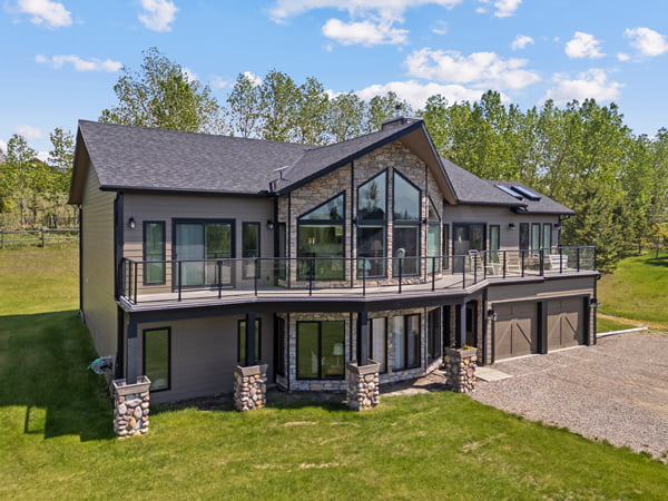 Foothills County, AB – Draftlock Plus triple pane shaped trapezoid windows, exterior view