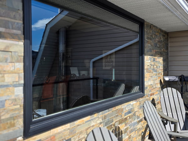 Longview, AB – Draftlock double pane windows overlooking the river, exterior view