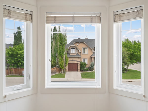 West Springs, Calgary – Draftlock Plus triple pane windows with cottage-style grills, interior view
