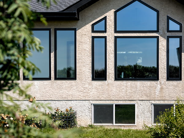 Sturgeon County, AB – black trapezoid triple-pane windows, exterior view