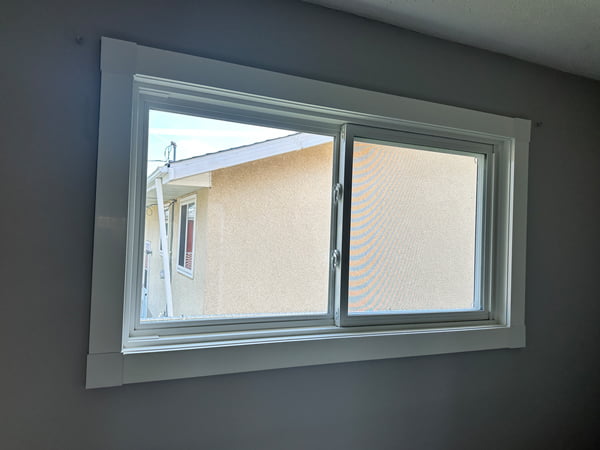 Bon Accord, AB – triple pane window installation, interior view