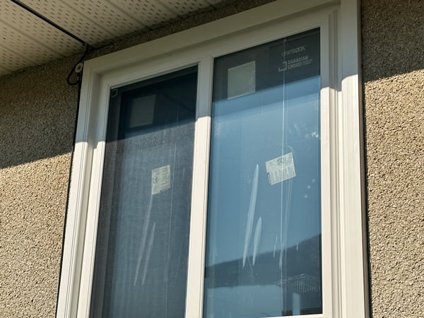 Bon Accord, AB – triple pane window installation, exterior view
