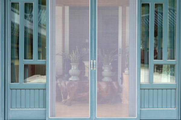 Retractable screen installed on a patio door
