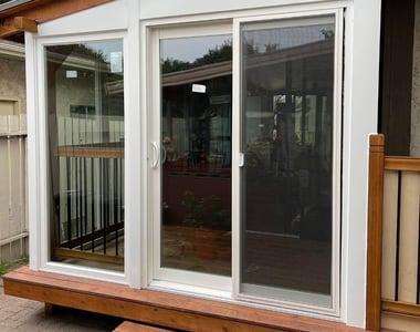 Vinyl sliding patio door and windows installed in Vancouver
