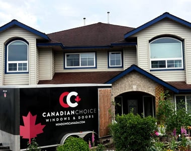 Vinyl windows installation on a two-storey Vancouver home by Canadian Choice Windows & Doors