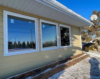 White vinyl windows replacement on a Vancouver home