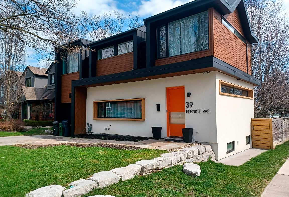 Custom-sized vinyl windows and steel entry doors installed on a modern Canadian home